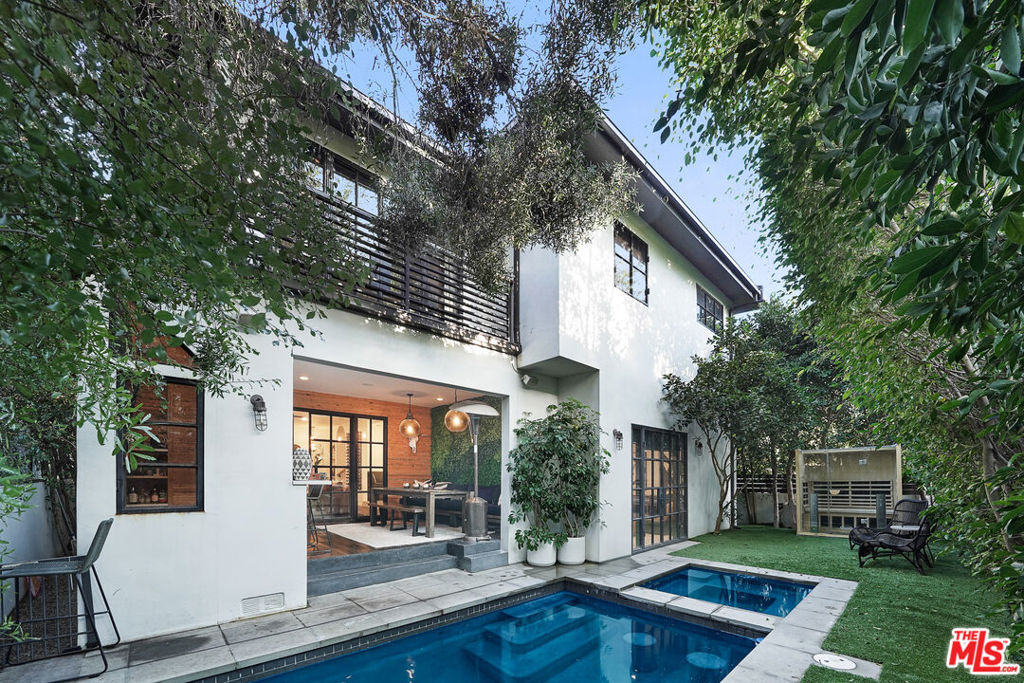An exquisite contemporary architectural home located in the prestigious Marina del Rey neighborhood of Los Angeles. In this flawless furnished residence you will find six bedrooms, four bathrooms, a gorgeous pool, and an endless amount of entertaining areas. Custom iron doors give way to natural light throughout the home. Step inside to a bright and open floor plan that creates a seamless flow between indoors and out. It has a well-appointed gourmet kitchen on the first floor, which is sure to please even the most discerning chefs, equipped with a wide variety of top-of-the-line appliances, as well as a spacious family room, a cool secret kids play room, built-in dining booth, living room, bar, bathroom, first bedroom, and a single car garage for your convenience. As you enter the patio, you will find a custom-built barbecue and bar that are sure to enhance your outdoor dining experiences for year-round enjoyment, whether you are hosting a party or simply relaxing in the ambiance of the area. Take a dip in the pool and enjoy a little time in the sun or relax in the spa or in the two-person sauna. This outdoor oasis continues with a meticulously landscaped backyard that offers everything you could desire from an outdoor oasis. A spacious, dreamy primary bedroom on the second floor is separated from a luxurious oversized bathroom with a walk-in closet and a luxurious oversized bathroom with iron pocket doors. The other four bedrooms on this floor are also set up as a home office with custom-built-in cabinets, an at-home gym, and two guest bedrooms, making for a total of six bedrooms. On the rooftop deck, you'll discover ample opportunities for entertaining with a TV, surround sound speakers, a second built-in bar, multiple fire pits, sofa pit, sunbathing lounges, and breathtaking 360-degree views! Experience a sense of detachment while enjoying the comforts of Westside living in this luxurious retreat!