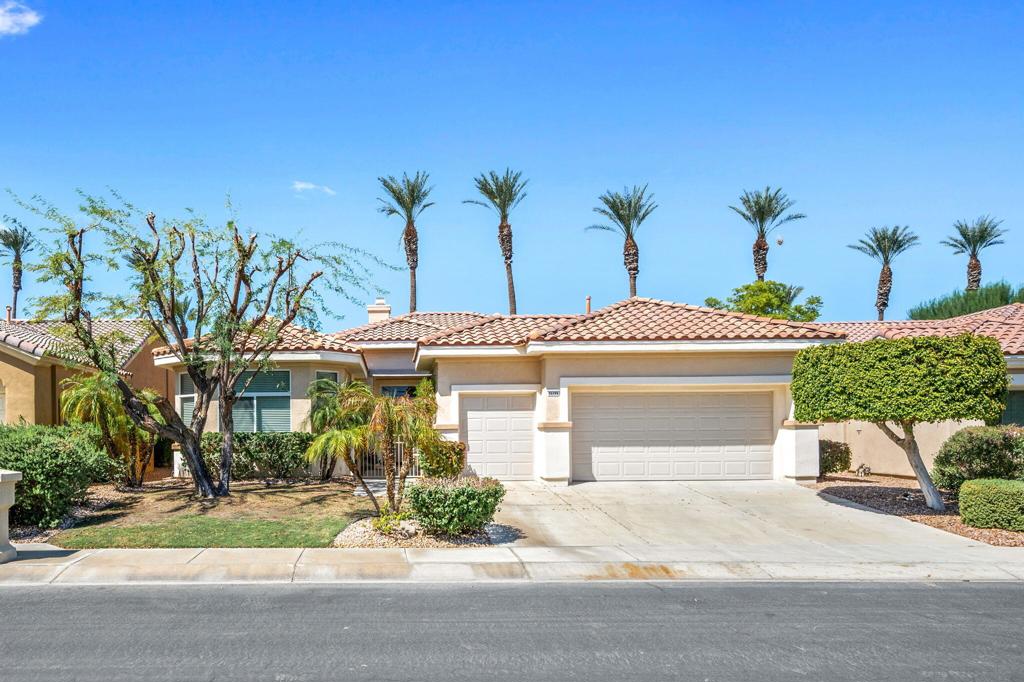 LOWEST PRICE: Monterey floor plan nestled in the highly sought-after guard gated (55) Sun City Palm Desert community. This magnificent home is perfectly situated between the Lakeview and Sunset View clubhouses, allowing you easy access to a variety of amenities and activities. It's time to start the next chapter of your life with LOW HOA's and tons of Amenities! As you approach, a charming gated front courtyard greets you, providing both curb appeal and privacy. Step inside to find a spacious, open layout featuring tile flooring throughout, except in the cozy bedrooms. High ceilings and abundant natural light create an inviting atmosphere, making this home an entertainer's paradise.The expansive great room seamlessly connects to the elegant formal dining area, providing a perfect space for gatherings. The chef's kitchen is equipped with Corian countertops, a generous island, a breakfast bar, and a sunny nook--ideal for casual dining. Ample storage is provided by a large pantry, ensuring you have everything you need at your fingertips.Retreat to the primary suite, which offers direct access to the west-facing rear yard through a sliding door, allowing for tranquil evenings by the serene fountain surrounded by vibrant Bougainvillea. The suite features a spacious walk-in closet and a luxurious bathroom complete with dual sinks, an oversized tub, and a stall shower.Your guests will appreciate the privacy of the guest suite, which includes its own bath and a separate entrance to the front courtyard. Additionally, the versatile utility room, designed as extra living space, can function as an office or additional sleeping area, making it ideal for visitors.The property boasts a two-car garage with a dedicated golf cart garage, and the best part? A golf cart is included with your purchase! Enjoy low HOA fees while taking advantage of the extensive amenities Sun City Palm Desert has to offer, including golf courses, tennis courts, swimming pools, fitness centers, and numerous social clubs.Don't miss this opportunity to own a beautiful home in an exceptional community. Schedule your private tour today!