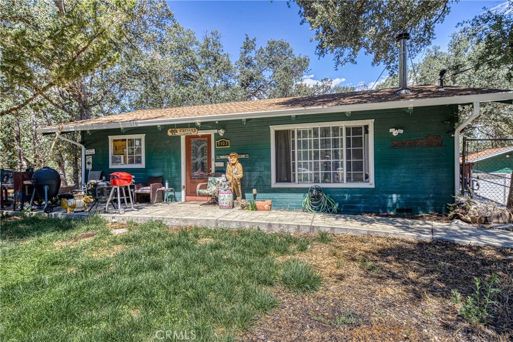 Escape the hustle and bustle of city life and discover the serenity of this idyllic country setting—perfect for those seeking peace, privacy, and proximity to essential amenities such as schools, shopping, and services. Nestled on a double lot that backs onto a tranquil year-round creek, this beautifully maintained 4-bedroom, 2-bathroom home offers the best of both worlds: rural charm and modern convenience. Step inside to find inviting vaulted open-beam ceilings, a cozy wood-burning stove, and elegant granite countertops that add a touch of sophistication to the kitchen. Thoughtfully designed with accessibility in mind, the home also features an ADA-compliant entrance for ease of mobility. In addition, Habitat for Humanity has been approved to install energy-efficient ductless mini-split systems, offering a modern, cost-effective alternative to traditional central heating and air. Situated on over half an acre, the expansive lot provides ample space for RV parking, recreational toys, gardening, or future expansion. Whether you're looking for a fulltime residence or a peaceful weekend retreat, this property offers exceptional value and a rare opportunity to own a piece of California’s natural beauty. Don’t miss your chance to make this lil' slice of heaven your own. Inquire today!