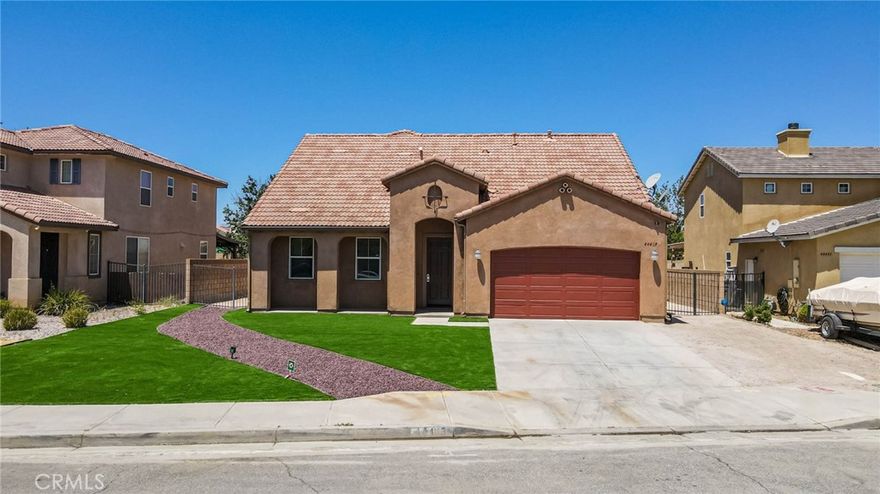 Beautiful House! Totally remodeled with new appliances, two new unit A/C condensers with smart thermostat, Kitchen Island with granite counter tops, open living room for entertainment, family room with fireplace, plus a loft on the second floor. Big master room downstairs with a huge master bathroom, two additional bedrooms with wood flooring throughout the house, High ceilings with recessed lightning, new fans. Laundry room inside, garage for two cars. New landscaping and very well maintained. Quiet neighborhood and with access to everything, shopping, restaurants, transportation and freeway. You won't be disappointed.