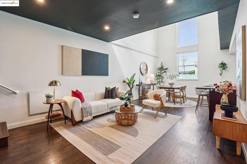 Stunning remodeled condo loft in prime Oakland location.Over 1,700 sq ft of fully renovated living space with a bright, open layout and abundant natural light. This modern loft features high ceilings, sleek finishes, and a spacious attached garage with 500+ sq. ft. of additional storage/parking. Ideal for those who value both style and convenience, this home offers easy access to major freeways, dining, shopping, and more. 18 minute walking proximity to BART, 2 minutes away from a bus stop, and an easy 10 minute walk to OCMA friday nights.