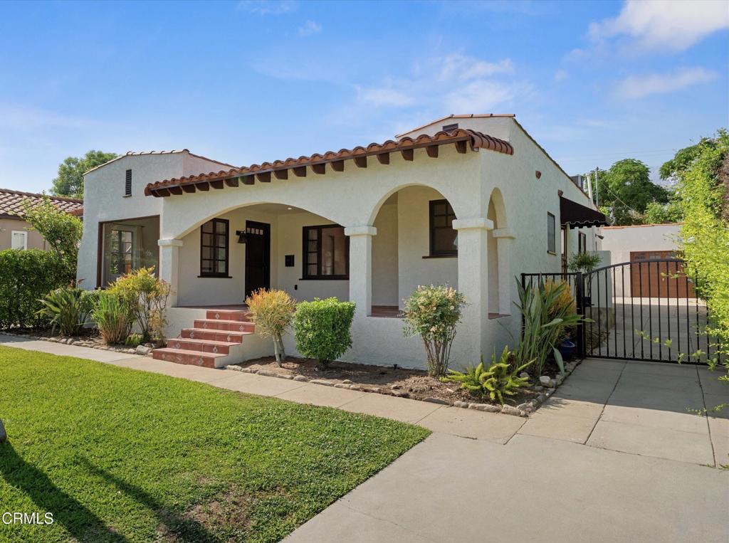 Located on a desirable street with scenic mountain views, this charming 1920s Spanish-style residence exudes warmth and character. Past the Saltillo-tiled front porch, you'll find a light-filled interior featuring original hardwood floors, decorative fireplace and a large picture window. Just off the formal dining room, the kitchen includes stainless steel appliances, ample cabinetry and a cozy breakfast nook. There are 3 generously sized rooms including a primary bedroom with an ensuite bathroom. The third bedroom extends into an office/den area with built-ins -- perfect for remote work or creative space. Enjoy a private and inviting back yard space, surrounded by fruit trees. Additional highlights include central AC and heat, freshly painted interior/exterior and a detached garage, plus a long driveway with plenty of room for parking. This home offers a peaceful retreat just minutes from all that Pasadena has to offer!