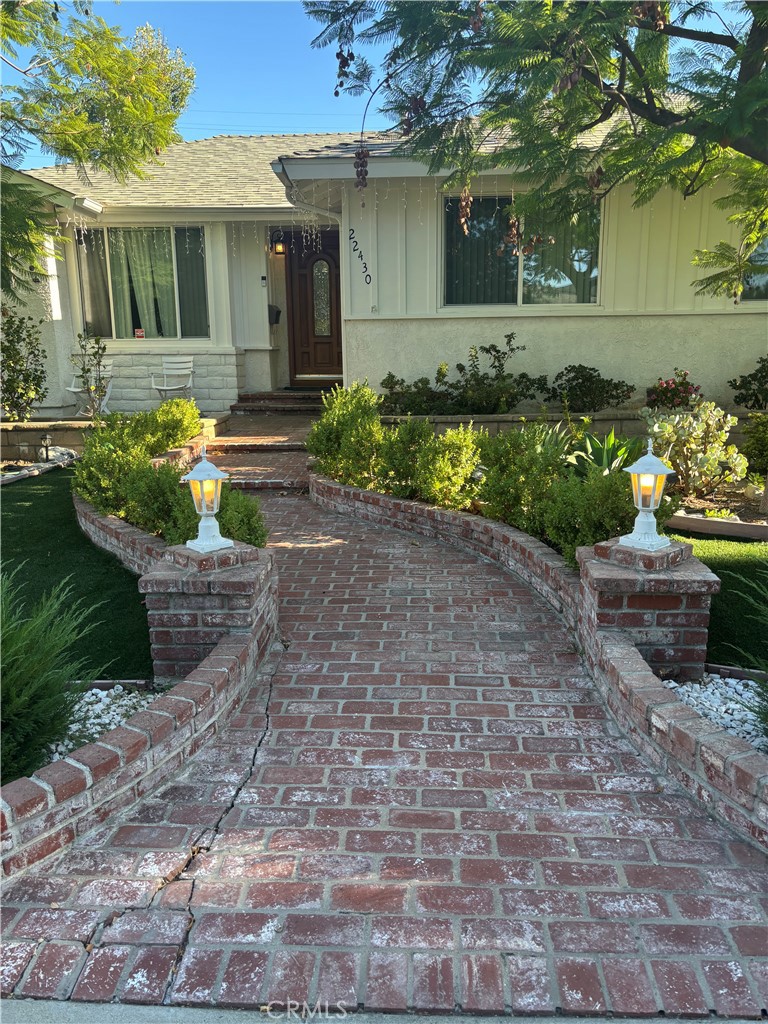 Now available for lease, this gorgeous 4-bedroom, 2-bathroom home offers the perfect blend of comfort, style, and functionality. Located on a peaceful street with beautiful landscaping and excellent curb appeal, this corner property radiates care and attention throughout with dual pane windows, recessed lighting, and stunning red-oak wood flooring. The open floor plan features a spacious kitchen with stainless steel appliances, a convenient laundry room, a welcoming great room, and an upgraded ensuite guest bathroom with travertine tiles. The home truly shines outdoors with a gorgeous, spacious backyard complete with brick decking, lush landscaping, a serene waterfall feature, and a separate storage room perfect for extra storage, while the detached 2-car garage offers additional space and convenience. This home is both cozy and inviting, making it the perfect place to call home—all within walking distance to the Fallbrook shopping center.