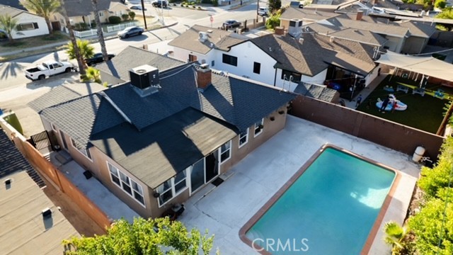 Discover this spacious 4 bedroom, 3 bath home nestled in the heart of North Hollywood, perfectly balancing comfort, flexibility, and an unbeatable location. Enjoy generously sized bedrooms and an open sunlit floor plan accented by a blend of tile and wood flooring throughout. AC system ensures cool comfort during warm summer days. The well-appointed kitchen features ample cabinet and counter space, making it ideal for both everyday cooking and entertaining. The large backyard includes beautiful pool making it perfect for relaxing, or hosting friends and family. attached 2 car garage converted into an ADU (1 bed, 1 bath) with all separate meters and separate entry. Located in a desirable neighborhood close to parks, shopping, dining, and major freeways, live in one and rent out the other one. Hurry this well-maintained home is an excellent opportunity for those seeking convenience and value in one of the Valleys safest communities.