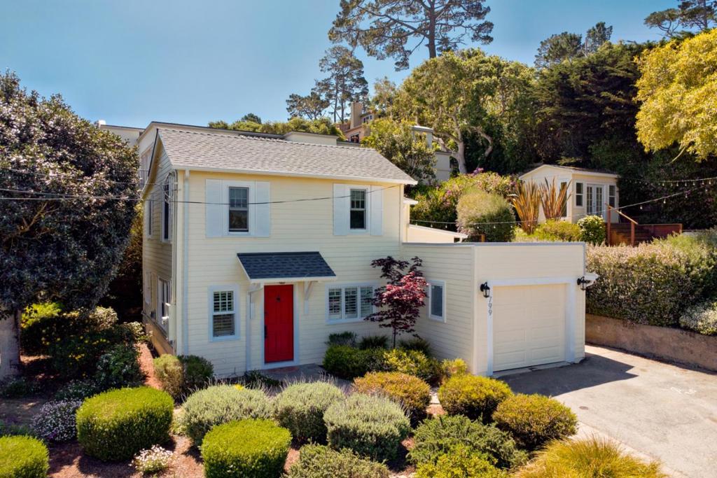 Discover this beautifully remodeled 2-story residence built in 1926 blending timeless character with modern updates. This 3-bedroom, 1-bath gem features a charming living room and an updated kitchen that shines with new cabinets, counters and flooring. Adjacent is the laundry room with a sink and washer/dryer hook-ups. Perhaps space for a second bath? Three bedrooms are located upstairs close to the stunning remodeled bathroom with custom tile floors, crisp patterned inlays, and sparkling glass accents. In the raised area of the side yard sits a detached shed/or artist studio and a spacious outdoor sitting area that enjoys stunning views of Monterey Bay. With much of the lot undeveloped, future expansion is a great option. Located just minutes from Cannery Row, the Monterey Bay Aquarium, the scenic Recreation Trail, and historic downtown Pacific Grove, you'll never lack for a way to enjoy the Monterey Peninsula lifestyle.