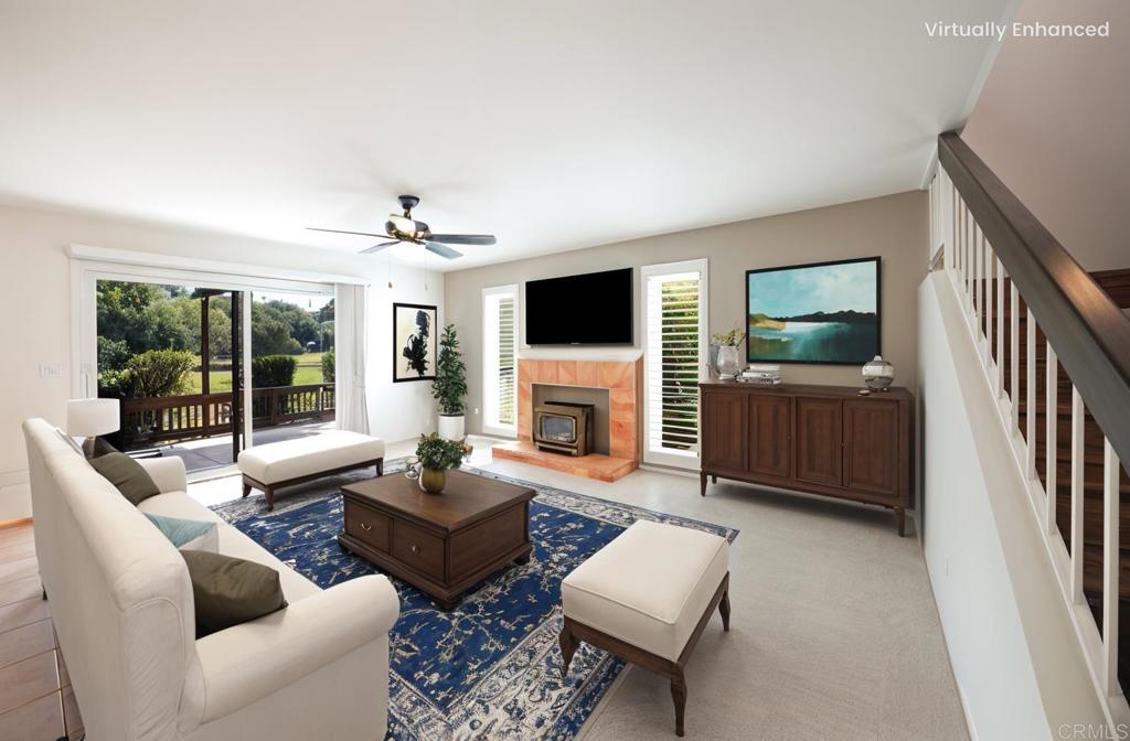 This light and bright condo is on the 16th fairway of the beautiful San Vicente Resort Golf Course for wonderful views right outside your door. Talk about Location, location, location! This 2 bedroom 2 bathroom condo offers 1 bed and 1 bath downstairs along with an indoor laundry room, spacious kitchen and dining room adjacent to the living room with cozy fireplace. Upstairs you will find the primary bedroom with bath and an added bonus of an extra space to use as an office, den or large closet. This space has two skylights for a bright open feel. A whole house fan helps with cooling as needed and the unit comes with a one car garage and one car carport. The roofs were replaced in 2024. New carpet was just installed. Plantation shutters in the bedrooms. You are close to the community pool in Country Villa and within walking distance to the San Vicente Resort which offers dining, sports bar, pickleball, golf, large community pool with snack bar and driving range! Come see all this wonderful community and home has to offer!