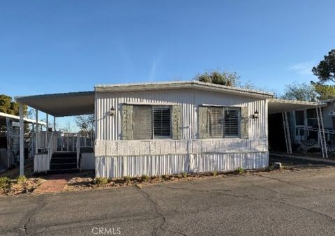 Photo of 11414 Serra Rd #17 Rd, Apple Valley, CA 92308 (MLS # HD25279619)