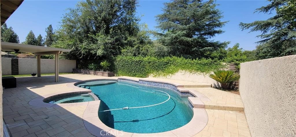 WELCOME TO THIS BEAUTIFUL 4/2 POOL HOME! THE SELLER IS IN THE PROCESS OF REFRESHING BOTH THE INTERIOR AND EXTERIOR WITH NEW PAINT. YOU WILL ALSO ENJOY A BRAND-NEW KITCHEN, NEW FLOORING, AND RECENT UPGRADES THROUGHOUT. CONVENIENTLY LOCATED NEAR THE 91 FREEWAY, RIVERSIDE UNIVERSITY, AND THE COLLEGE, THIS HOME OFFERS BOTH COMFORT AND CONVENIENCE. IT WILL BE READY TO MOVE IN SOON AS THE SELLER COMPLETES THE FINAL TOUCHES. COME AND SEE THIS WONDERFUL PROPERTY BEFORE IT’S GONE!