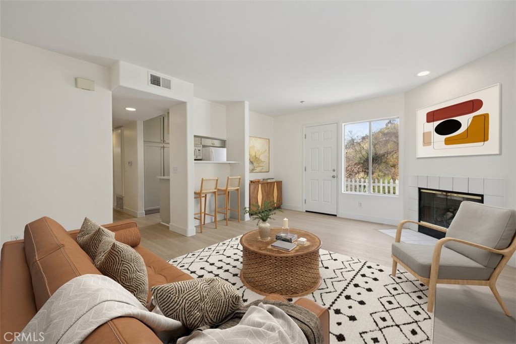 Welcome to beautiful Las Flores Canyon Unit C. For lease is a 2 bedroom 2 bath townhouse located in a 4-unit building. It has a full bed and bath upstairs and downstairs. A secluded entry around the side with your own HUGE private patio/yard which looks out towards the oak trees, mountains and a seasonal stream. As you walk through the door you see the kitchen and living space and just down the hall is the first bedroom and full bath, upstairs leads you to a huge loft style room with another full bath. This unit has been renovated to include new flooring, new paint, and new quartz counter tops. Just a short drive to Santa Monica, the country mart and so much more. Living next to the mountains with million dollar views and the ocean...it doesn’t get better than this.