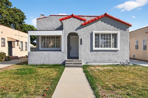 Photo of 8734 Dalton, Los Angeles, CA 90047 (MLS # IN25249710)