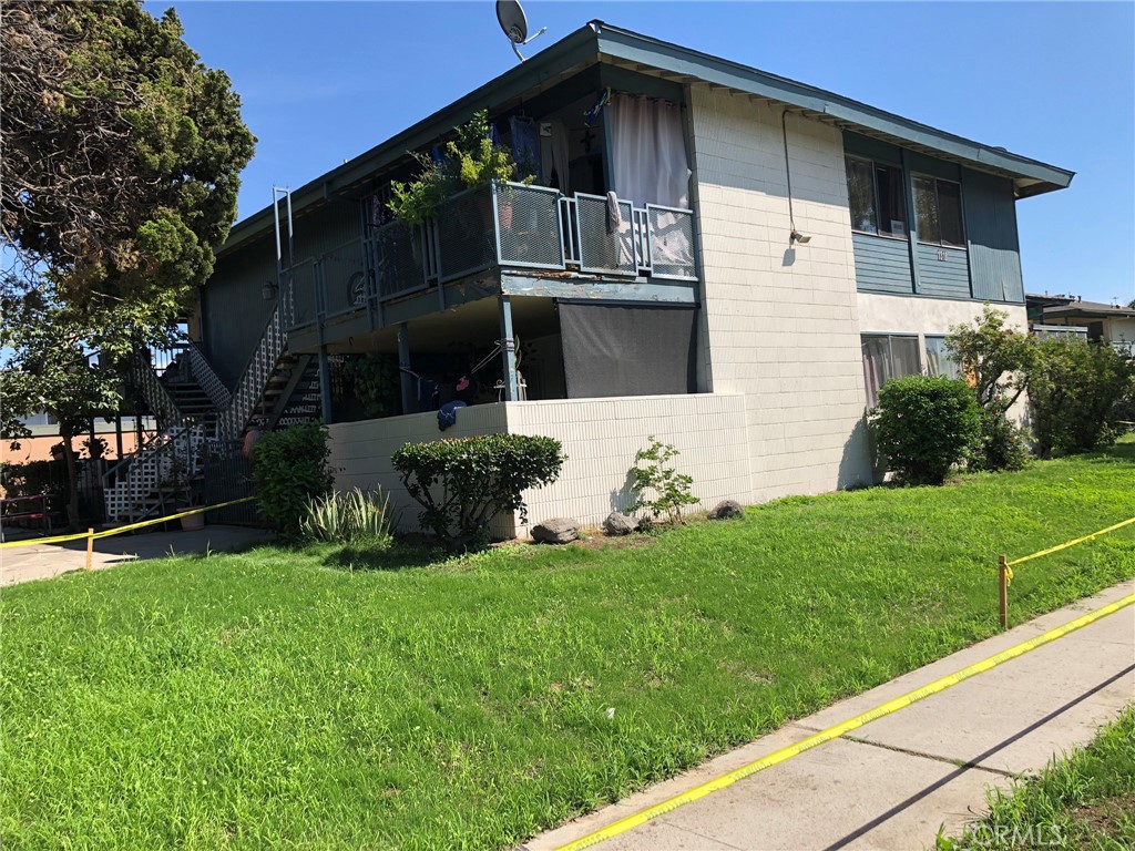 Great investment-- All 2 Bedroom 2 bath fourplex with grassy yards and sprinkler system with timer. Highly desired rental units. Units are spacious at approximately 955 sq. ft. per unit. Features include breakfast bars flowing to dining room. 2 upper units with large covered balconies; 2 lower units with enclosed front patio courtyards. All are end units. Single car garage with newer roll up doors for each unit. Extra 5th garage rents for $150 per month. Most units have updated improvements--bathrooms, floors, kitchens, lighting. All have a 220 A/C outlet n living room. Community laundry room generates additional income. Placentia Yorba Linda Unified School District attendance area. Located on a cul-de-sac near a local city community center and Mira Loma Park. Plenty of yard space to enjoy.