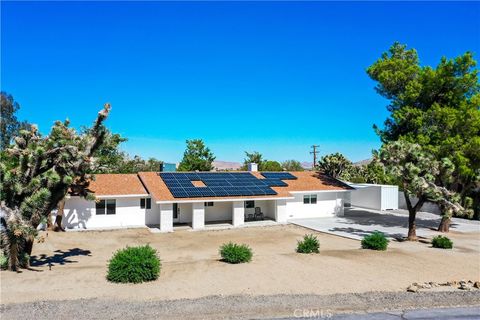 Photo of 56800 Java Drive, Yucca Valley, CA 92284 (MLS # OC25275036)