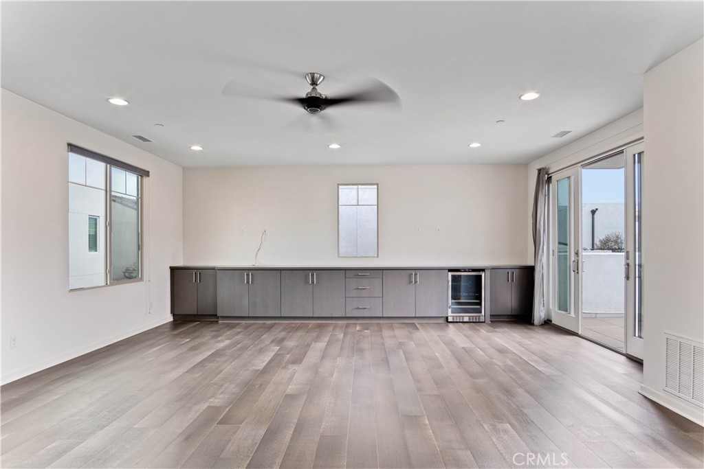 Discover this stunning terrace home tucked inside the sought after 360 South Bay gated community. Thoughtfully designed with modern elegance, this contemporary retreat effortlessly blends indoor and outdoor living. Set within one of the South Bay’s most desirable neighborhoods, this four bedroom home spans over 2,187 square feet and includes 2.5 bathrooms.
Head to the top floor to find a spacious indoor outdoor terrace that opens up endless lifestyle possibilities.
What sets this property apart is its rare HOA approved outdoor kitchen setup, featuring a premium Blaze BBQ system with a built in double side burner, keg tap, refrigerators, farm style sink, custom cabinetry, and a wine fridge. No other home in the community offers this elevated experience.
Inside, enjoy an open concept floorplan with expansive living and dining areas that flow into a chef’s kitchen outfitted with high end appliances and sleek engineered wood flooring. A conveniently located powder room completes the main level.
Step outside to your own private retreat with direct access to a two car garage plus an additional third parking space. Upstairs, you’ll find four spacious bedrooms and a full laundry room on the second floor. The third floor features an oversized entertainment room perfect for movie nights, weekend hangouts, or relaxing mornings and evenings around your private fire pit.
As a 360 South Bay resident, you’ll benefit from access to the award winning Wiseburn School District, known for academic excellence. The community offers an impressive array of amenities including two heated pools, a large spa, cabana lounges, a cutting edge fitness center, BBQ areas, a game room, wine room, event space with a commercial grade kitchen, dog parks, playgrounds, on site management, ample guest parking, and 24 hour roaming security.
Welcome to elevated coastal living in one of the South Bay’s finest communities.