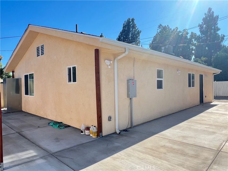 Brand new 1,200 square feet ADU located at 6863 Winnetka Ave.  3-bathrooms plus 2 full bathrooms laminated flooring throughout, the back house of can be either enter from the alley or from the front house (6863).   The home is fully equipped with separate electrical meter & a solar penal system for energy efficiency.  Freshly painted inside and out, this ADU was built with all new services and completed with full city permits and inspections.