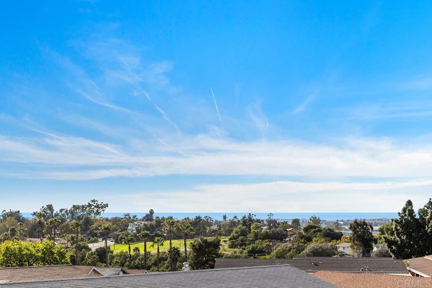 OCEAN VIEW property located on a corner lot within a 55+ resort style community w/ rent control.  Private wrap around deck with views of Catalina Island and Sunsets, not to mention ocean breezes!  Kitchen and Bathrooms have been upgraded.  Crown moulding & vinyl windows.  The Primary Bedroom has a large walk-in closet and ensuite Bathroom.  The laundry room is oversized with extra storage space.  The outdoor shed can serve as a workshop, it's complete with cabinets, shelving and electricity.  Rancho Vallecitos is a beautiful, 5-Star, resort style community for persons 55 years of age and over (2nd resident can be age 45+). One of the most beautiful manufactured home communities in California, Rancho Vallecitos has great views that can be enjoyed throughout the community, plus many social activities and amenities. Amenities include a clubhouse/recreation building, pool & spa, library, gym, billiards room, card tables, game and craft room, putting green, dog park, RV parking for an additional cost, and so much more!  Monthly space rent is $740 and the park is under city rent control.