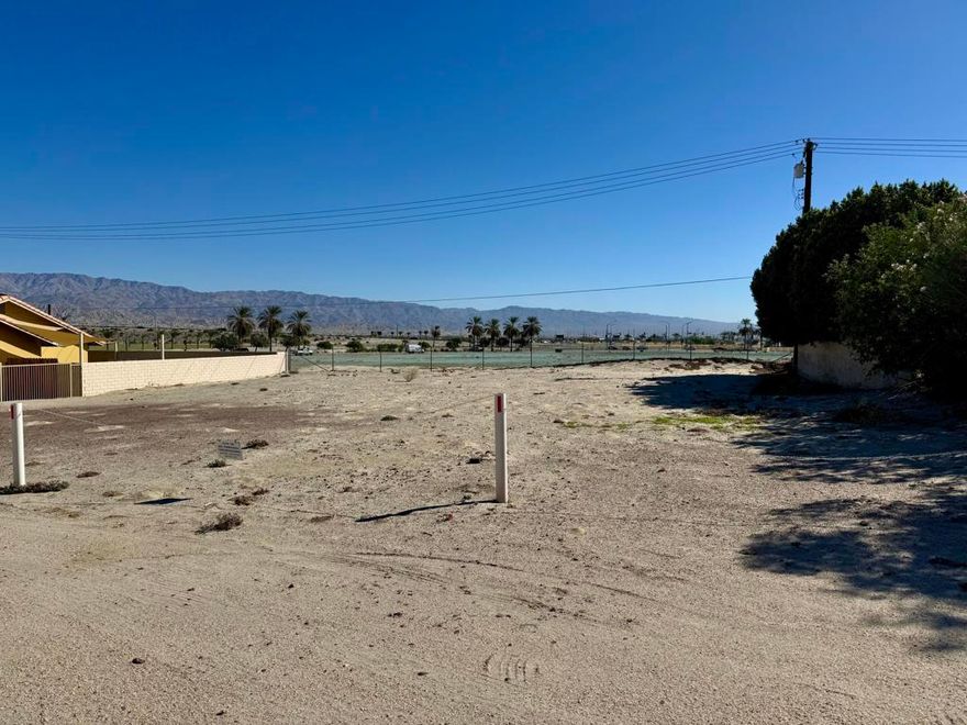 A rare opportunity to build your dream desert retreat on a spacious 10,000 plus sq foot lot within the prestigious, guard gated Bermuda Dunes Country Club. This prime location offers a quiet interior setting, is conveniently located near the back gate, and features utilities nearby with the benefit of low cost Imperial Irrigation District electricity. The lot is surrounded by custom homes and provides the perfect canvas for a custom residence, allowing you to bring your vision to life in this sought after golf community. Home next to the lot can be purchased as well. Please inquire.