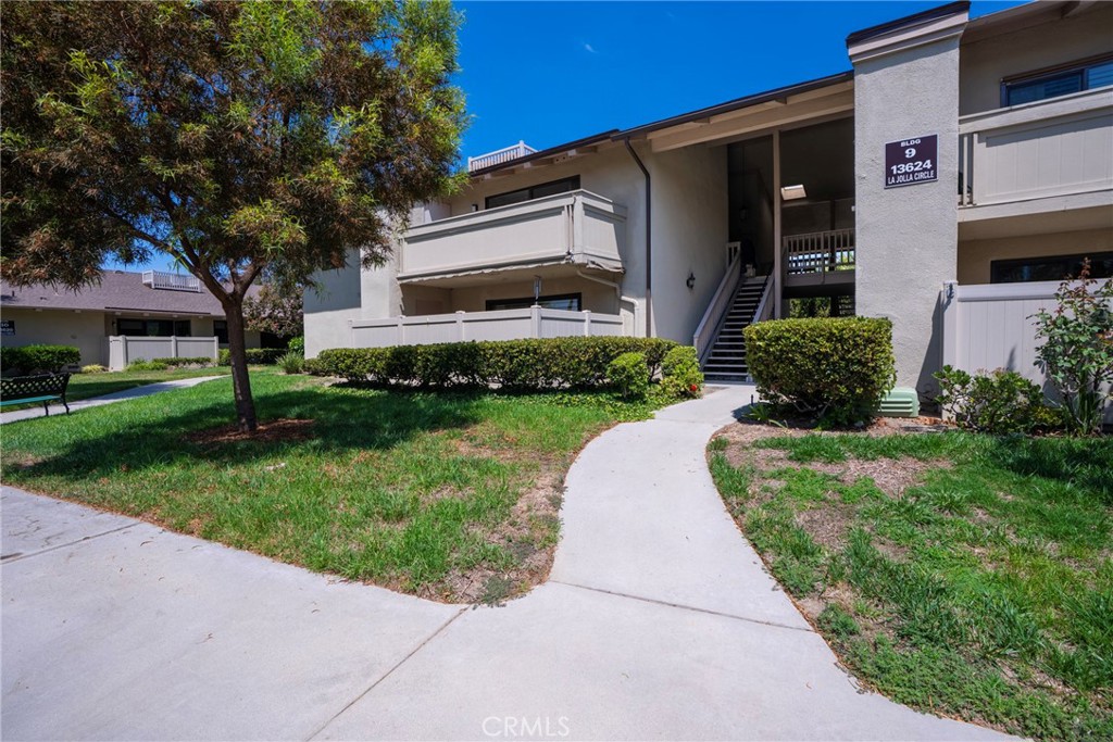 Welcome home to 55+ living at its finest. The 24 hour hour guard gated community of Landmark offers a secure place to call home that also features a convenient location and ample amenities. Between the tennis courts, salt water pool, putting green and vibrant community it is truly resort style living.
This light, bright, fully equipped and complete package has 2 Bedrooms, 2 Full Bathrooms, In Home Laundry hookups and Machines and 2 Car Garages which are just a few steps down on the backside of the building. Unit has just one common wall. Modern flowing designed wood grain like tile floor throughout give this home a seamless continuity. Come and see the perfect place to call home!