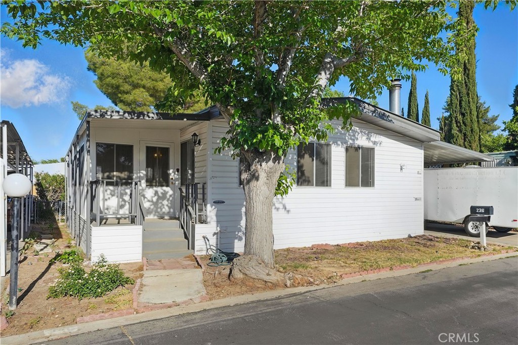 Now is your chance to own a home in the desirable Rancho Mirage Mobile Home Community! This 2-bedroom, 2-bathroom home features a fireplace, a spacious kitchen with plenty of storage space, and large bedrooms! The home has also been recently repainted, and has had a new shower/tub installed. This safe community features a variety of amenities, such as a clubhouse for events, a swimming pool, tennis courts, basketball courts, and a playground for kids! Don't miss your opportunity to call this home!