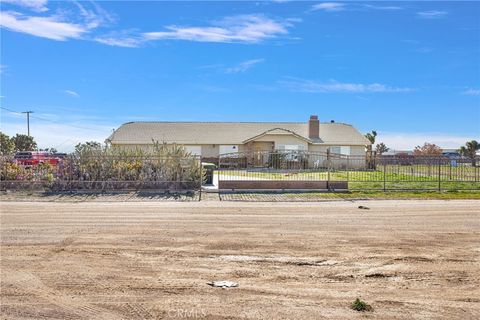 Photo of 10276 Aster Road, Oak Hills, CA 92344 (MLS # HD26027540)