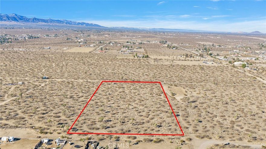 Welcome to Phelan where your view is snowcapped mountains in the winter and spectacular desert sunsets/sunrises all year round!  This great 5-acre parcel is not far from paved road and there are many neighboring homes that have utilities. Commuter friendly location as well as in the Snowline School District.  Take a look today!