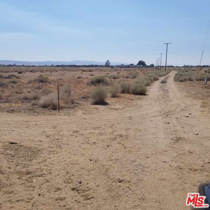 Expansive 6.7 acres in Antelope Acres, Lancaster, CA. Flat, buildable, with power and water in the street. New custom homes are being built in the area. The property offers unmatched potential for residential development, recreational use, or as a long-term investment. Situated in an Opportunity Zone for potential tax benefits. Vast open space for exploration and adventure in the serene California desert. The Attractions are: Antelope Valley, California, including the California Poppy Reserve, Kern River, and Mountain High Resort.