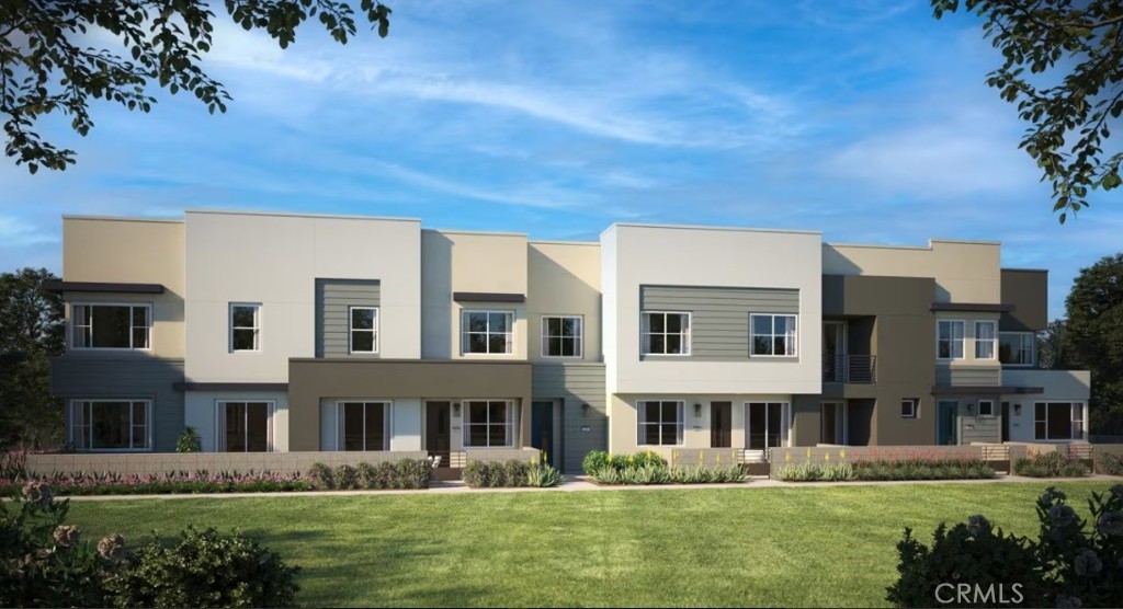 Eave, a vibrant collection of CA Modern courtyard townhomes designed for comfortable living in the open airy layout. This 2 bedroom, 2.5 bath and 2 car garage offers a modern design and stylish comfort. This home in an upscale lifestyle community has an inviting outdoor patio perfect for relaxing or entertaining, and only steps away from a park with BBQ grills and covered benches, Dog Parks & adult Exercise area. This peaceful community is designed for those seeking both elegance and functionality, featuring a Samsung 30 slide-in induction range with a self-cleaning oven, an over-the-range microwave, and a dishwasher-all in sleek stainless steel. The kitchen shines with white flat-panel cabinets, quartz countertops with tile backsplash. Bathrooms are elevated with Bella Carrara countertops. CA Modern exterior as well, Most Design Options are available at time of listing to customize your home depending upon builder cut-off dates for a late Fall move-in! Endless Amenities: resort-style lap pool and kiddie pool, jacuzzi, half basketball court, passive park, dog park, children's playground, fire pit, BBQ and corn hole