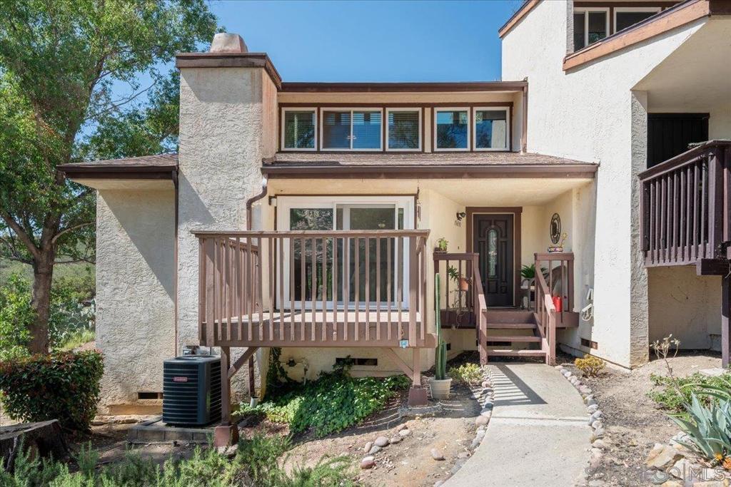 Don't miss this beautifully maintained 3-bedroom, 3-bath end-unit condo located in the highly desirable San Diego Country Estates in Ramona. This rare corner unit offers extra privacy, scenic surroundings, and incredible views from multiple angles. Inside, you’ll find thoughtful upgrades throughout—wood floors, dual pane windows, and a new digital keyless entry door for added convenience and security. The living room features brand-new carpet, while the upstairs hall boasts elegant bamboo flooring. The spacious kitchen benefits from a window with a view—a unique feature of this corner unit that fills the space with natural light. Retreat to the updated master suite, complete with a new vanity, mirror, and flooring in the bathroom. A brand-new water heater adds to the move-in-ready appeal. Unit also includes TWO designated carports for parking. Step outside and immerse yourself in community fun! Just across the street, enjoy a park that comes alive in summer with live music, a 4th of July parade, and other seasonal events. Ramona also hosts Oldie Cruise Nights every Thursday throughout summer—perfect for car enthusiasts and nostalgic nights out. Residents of this well-kept community enjoy access to four pools—two within the condo complex, one at the park, and another at the San Vicente Golf Course, where you can also relax at the Par Lounge. This is more than a home—it's a lifestyle. Rare corner units like this don’t last long!