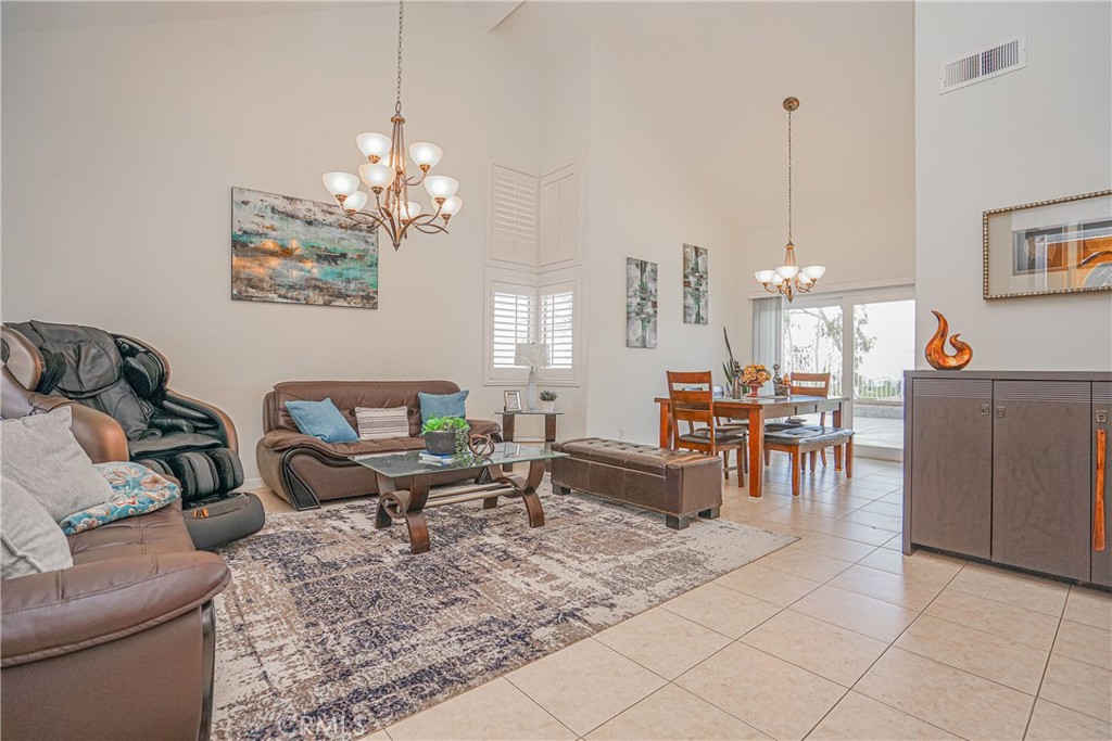 This beautifully upgraded home is nestled in the sought-after Sierra Del Oro community — just one exit from Yorba Linda in Orange County, with quick freeway access, nearby shopping, and top-rated schools. Perfectly designed for a family seeking something special and move-in ready, this home offers a blend of comfort, style, and function.
Step inside to a spacious entryway and family room that flows into the formal dining area, accented by a dramatic staircase. The cozy great room with fireplace connects seamlessly to the gourmet kitchen, featuring granite countertops, teak cabinets, stainless steel accents, and newer stainless-steel appliances including dishwasher and microwave. A whole-house water softener adds modern convenience.
Upstairs, the upgrades continue with granite and custom finishes in the hallways and bathrooms. A spa-inspired primary suite boasts a sunken tub, stand-up shower, and natural light throughout. Beautiful laminated flooring and custom tile enhance the entire home.
Recent updates include fresh interior paint, new screens on patio doors, and new vertical blinds, complementing the home’s modern appeal.
Outside, enjoy wonderful curb appeal with refreshed landscaping, a newly painted exterior, and a low-maintenance backyard offering unobstructed mountain and city-light views — the perfect setting for relaxation or entertaining.