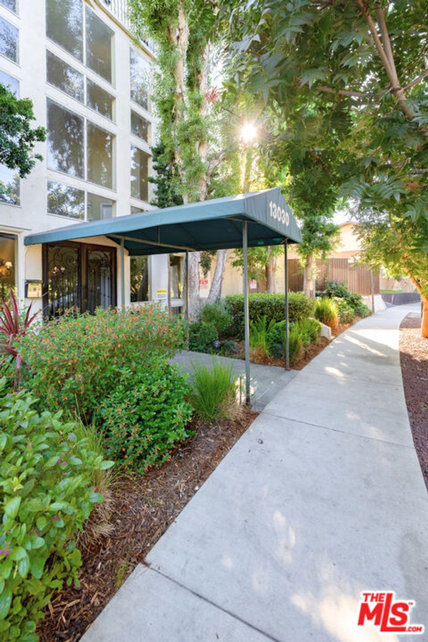Tucked away on a peaceful, tree-lined street in the heart of Studio City, this turnkey 2-bed, 2.5-bath condo offers effortless living in an unbeatable setting. As you enter, you're welcomed by a sun-filled main level featuring wide plank vinyl wood flooring and an open-concept layout that seamlessly connects the living and dining areas to your own private patio - perfect for entertaining. Upstairs, discover two generously sized bedrooms: the primary suite features an en-suite bathroom, while the second bedroom sits just steps from its own full bath. Additional highlights include in-unit laundry, two secure parking spots in a gated garage, and access to a community pool. Located just moments from The Shops at Sportsmen's Lodge - featuring Equinox, Erewhon, Sugarfish, Next Health, Rolling Greens, just to name a few - and within close proximity to the Studio City Farmers Market. All of this, set in the famed Carpenter School District. Central to everything: pop over the hill to Beverly Hills, hop on the freeway, and be anywhere you need to be - yet still feel peacefully tucked away from it all.
