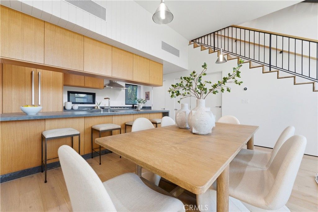 Photo of 11702 Charnock Road, Los Angeles, CA 90066 (MLS # LG26064690)