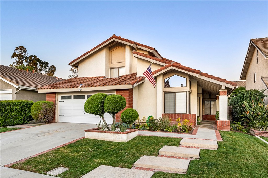 Discover this beautifully upgraded Northwood home, perfectly situated on a peaceful cul-de-sac in one of Irvine’s most sought-after neighborhoods. This spacious and thoughtfully designed residence offers four bedrooms and three bathrooms, blending comfort, style, and functionality.
Step through the inviting entryway into the elegant formal living and dining rooms, ideal for entertaining and gatherings. The newly updated kitchen boasts sleek countertops, modern fixtures, and a cozy breakfast nook, and it opens seamlessly to the expansive family room, complete with a warm and welcoming fireplace.
The home features a highly desirable layout, with one bedroom and full bathroom conveniently located on the main floor — perfect for guests, a home office, or multigenerational living. Upstairs, you’ll find three generously sized bedrooms, including the impressive primary suite. The primary retreat showcases soaring cathedral ceilings, two spacious closets, and a beautifully upgraded ensuite bathroom with dual sinks and a walk-in shower.
All bathrooms have been tastefully enhanced with stylish new countertops and fixtures. Throughout the home, you’ll find fresh paint and brand-new laminate flooring, creating a modern and cohesive feel.
Outside, the beautifully landscaped backyard offers a private oasis, perfect for relaxing or outdoor entertaining. Enjoy exclusive access to Northwood’s exceptional community amenities, including lighted tennis courts, swimming pools, and scenic parks.
Located just moments from the award-winning Santiago Elementary and within the highly acclaimed Irvine Unified School District, this home offers the best of Irvine living with top-rated schools, nearby shopping, dining, and recreation.
