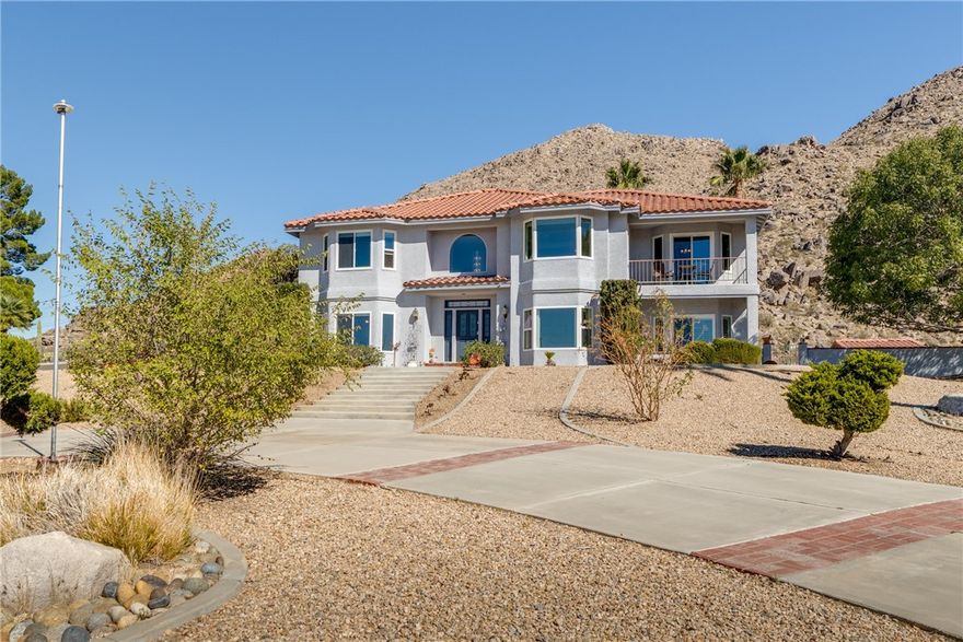 Welcome to 15879 Rimrock Rd in Apple Valley. This beautifully updated two story home features 4 bedrooms and 3 bathrooms, including a full bedroom and upgraded bath downstairs. The upgraded kitchen offers quartz countertops, soft closing drawers and cabinets, and energy saving new windows throughout. Enjoy vinyl plank flooring, plantation shutters, and new sliding doors that open to beautiful views.

The primary suite includes a Jacuzzi tub, separate stand up shower, and a private balcony perfect for relaxing and taking in the scenery. Laundry is conveniently located upstairs, with additional hookups in the garage. The 4 car garage is plumbed for an air compressor and includes a whole house vacuum system.

Outside you’ll find a newly hardscaped backyard with artificial turf and pavers, an RV pad with full hookups connected to the sewer line, and plenty of parking. The home has been recently painted inside and out and includes assumable solar panels for added efficiency. Move in ready, beautifully maintained, and offering stunning​​‌​​​​‌​​‌‌​​‌​​​‌‌​​​‌​​‌‌​​​‌​‌​​​‌‌​ views.