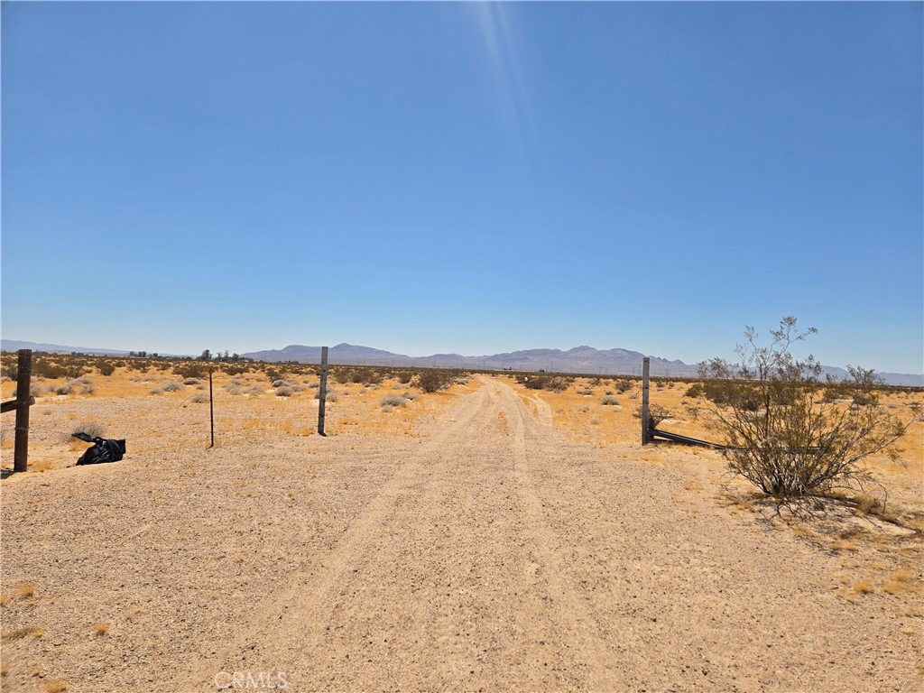 40 acres of flat land great for off-roading. Parcel is directly adjacent to BLM land. This particular BLM area has numerous off roading trails that connect directly to this parcel. Bring your dirt bikes, quads or RV. This parcel is easily accessible, just a mile north on Harvard Rd from exit 206 on I-15. Two minutes away from the 76 Gas Station and Convenience Store at the 206 Exit Intersection. Located in Newberry Springs situated in the western part of the Mojave Desert, 20 miles east of Barstow, and around 40 miles west of the Mojave National Preserve. Seller financing available. GPS Coordinates: 34.975807, -116.646726.