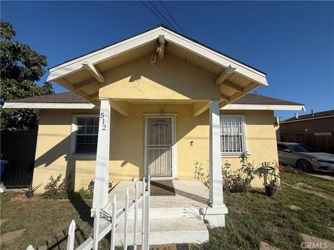Photo of 512 S Willowbrook Ave, Compton, CA 90220 (MLS # DW26033161)
