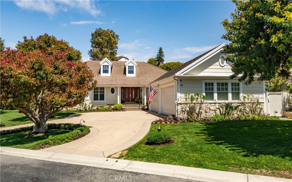 RARE OPPORTUNITY! First time on market in 25 years, beautifully maintained with pride of ownership from the original owner! Your chance to own and enjoy this single-level luxury turn-key residence nestled in the prestigious guard-gated community of Vantage Pointe. This exquisite property, one of only 67 homes in the development, offers 4 bedrooms and 3 ½ baths in 3,334 square feet of living space on a 16,962 sq ft oversized flat lot, located on a quiet cul de sac. Upon entering, you'll be greeted by an inviting open floor plan with high ceilings throughout. Straight ahead is the spacious living room featuring elegant custom coffered ceilings, hardwood floors, a fireplace, and large windows that fill the space with natural light, creating a warm and welcoming atmosphere. Off the living room is a sitting room, with the same hardwood floors, and shares the back side of the fireplace. French doors from the living room open to a back patio with a recently-built pergola with portable fire pit, a built-in BBQ, lawn area and beautifully manicured garden, and a tranquil fountain – perfect for outdoor entertaining. From the entry foyer, to the left, after passing the guest powder room near the entry, are the private living quarters featuring three well-appointed bedrooms, including an optional office, and a secluded luxurious master suite. Two of the bedrooms share a Jack-and-Jill bathroom for added convenience. The primary suite is secluded, while taking advantage of the beautiful backyard, and features two giant walk-in closets, access to the back patio, a fireplace, and an en-suite bathroom with dual vanities, a walk-in shower, a jacuzzi tub, and a separate toilet room with a bidet. Off the entry foyer and living room area, the gourmet kitchen is a chef's dream, equipped with two ovens, two microwave ovens, two dishwashers, a Sub-Zero refrigerator, ample cabinetry, and granite counters, and includes a separate breakfast nook overlooking the backyard. Off the kitchen is a dedicated laundry room with sink and storage, that leads to the 4-car garage, with plenty of cabinets for storage, and includes a workbench. The home includes a 6-camera security system and whole-home water filtration system. This exclusive community is conveniently located near stores, Golden Cove Shopping Center, Terranea Resort, and world-class golf and tennis clubs. Schedule a private tour today to experience the exclusivity, luxury and comfort that 48 Santa Cruz has to offer.