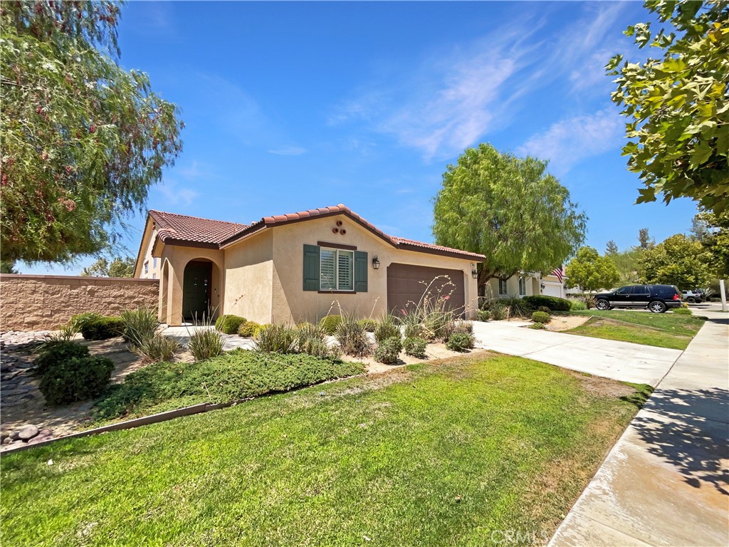 Welcome to your dream home! This property boasts a neutral color paint scheme throughout, providing a calming ambiance. The primary bathroom is a haven of relaxation with a separate tub and shower, complemented by double sinks. kitchen is a chef's delight with an accent backsplash, a center island and all stainless steel appliances. The covered patio and additional patio in the fenced-in backyard provide ample outdoor space for entertaining. This home is a must-see! 100-Day Home Warranty coverage available at closing