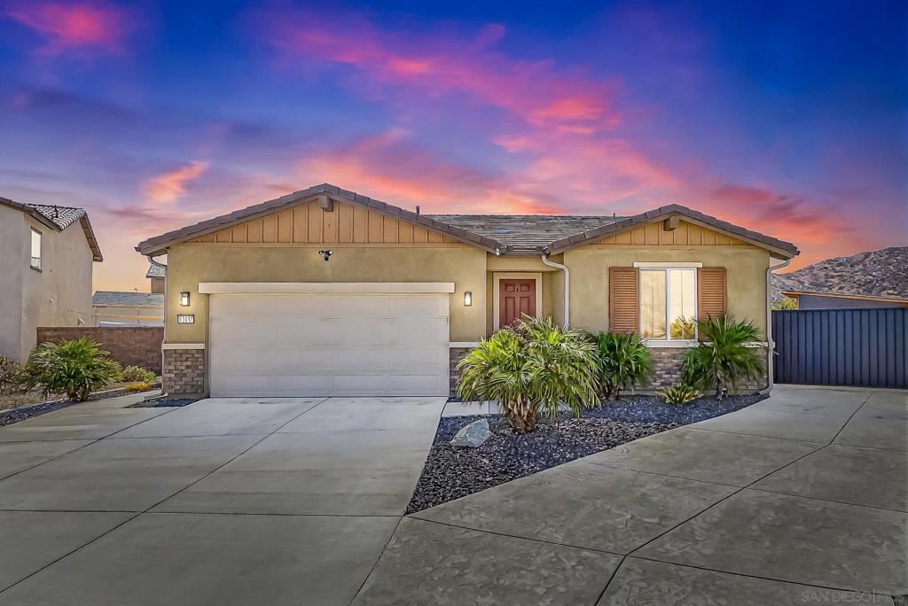We are excited to showcase a home that blends modern design with thoughtful craftsmanship. From the moment you arrive, you’ll appreciate the custom iron gates for RV parking, professionally finished garage, and inviting curb appeal. Inside, you'll find a space curated for comfort and style. Plantation shutters frame every window, large-format tile flows through the main living areas and into the spacious primary suite, and custom built-ins add charm and functionality throughout. The remodeled bathrooms and laundry room offer a fresh, sophisticated aesthetic, complete with quartz surfaces and custom cabinetry. Step out back to a low-maintenance retreat with turf, a covered patio, pergola, and ample space to relax or entertain. Energy efficiency meets everyday convenience with paid solar, a tankless water heater, QuietCool whole house fan, and more.