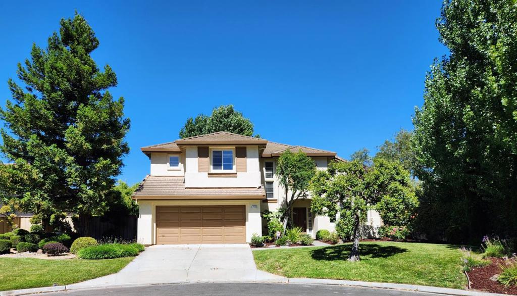 Welcome to Las Palmas 2! This lovely 3-bedroom, 2 1/2 bathroom with an additional permitted bonus room / loft located at the end of a cul de sac is just waiting for you. Interior is a spacious 1,840 sq ft living area and a large lot size of 8,311 sq ft. The kitchen is well-equipped with granite countertops, a new gas oven range, microwave, refrigerator with ice maker, and a dishwasher, making it ideal for culinary enthusiasts. Enjoy the separate family room with fireplace and a living room with a dining area and high ceilings for a relaxing atmosphere. There is a solarium just off the kitchen/family room that is ideal for multiple purposes. The flooring includes a mix of carpet, wood, and vinyl/linoleum. The primary bathroom features double sinks and an oversized tub for added luxury. Additional amenities include a walk-in closet, ceiling fans, and window/wall unit cooling. Laundry comes with a washer and dryer located inside with both 220V electricity hookup and gas hookup. The property is situated within the Spreckels Union Elementary School District. Enjoy the community pool along with other amenities or the hot tub just off the deck. The back yard is exceptionally large with beautiful landscaping. A perfect home for those seeking comfort in Las Palmas 2!