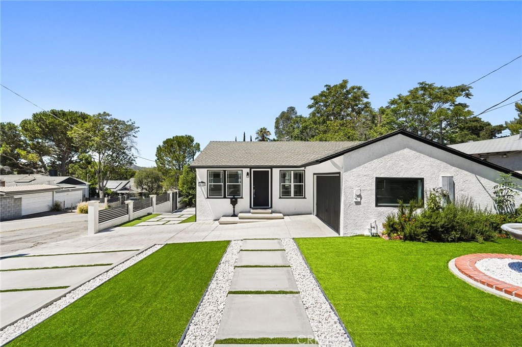 Stylish Modern Home with Amazing Curb Appeal! This modern updated home combines modern finishes with classic charm, a space that’s cozy and functional. As soon as you arrive, the exterior, fresh landscaping and private gated entrance sets the tone for what’s inside. Walk into a bright open living area with hardwood floors, tons of natural light and a seamless flow into the dining space—perfect for everyday living and entertaining. The kitchen has granite counters, elegant cabinetry, stainless steel appliances and a clean marble backsplash, cooking and hosting is a breeze. Three big bedrooms and a refreshed full bath, this home is designed for relaxation and convenience. Each room is light filled with stylish details and views. Since the home is on a corner lot, you have parking on both sides, life is easier for you and your guests. When friends and family come over you’ll feel proud to welcome them in. With its beautiful curb appeal, bright interior and thoughtfully designed spaces this is a home you can say “Yes, this is ours.” A home to make memories, celebrate milestones and enjoy everyday moments. The outdoor spaces have low maintenance landscaping, a private patio for BBQs or dining al fresco and a peaceful fountain that adds charm to the yard. With an attached garage, modern fencing and plenty of parking this home is as practical as it is beautiful. In a quiet neighborhood with mountain views, close to parks, schools, shops and commuter routes this is California living at its best. Don’t miss out on this move in ready home - schedule a private showing today!