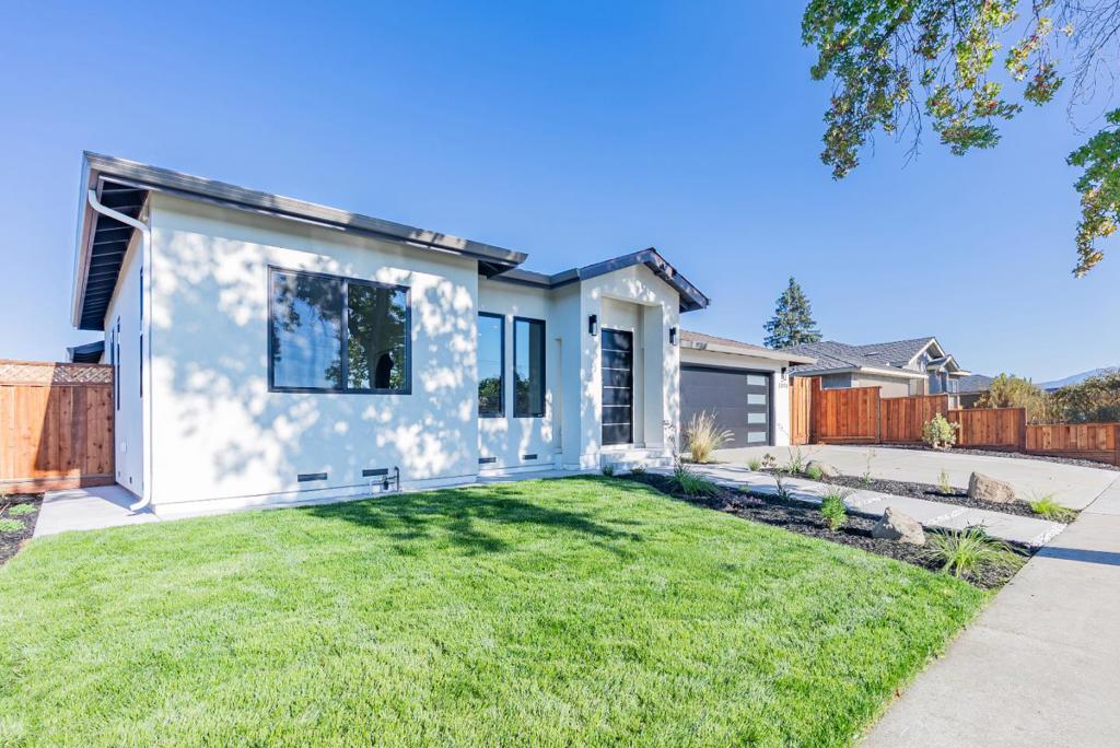 Extensively remodeled, this modern beauty feels like a new build with an added 924 SqFt of living space. Nestled in a calm neighborhood within walking distance of several shopping centers, it offers the perfect balance of convenience and tranquility. Upgrades include level 5 drywall finish, new doors, bedrooms, kitchen, heat pump HVAC, tankless water heater, updated electrical and plumbing, plus much more. Inside, enjoy soaring ceilings with recessed lighting, engineered wood floors, fireplace, skylights and dual-pane windows that flood the home with natural light. The updated kitchen connects seamlessly to the family room and features stainless steel appliances, quartz countertops/island and vast cabinet space. Down the hall, discover four spacious bedrooms with large closets, including two primary suites with walk-in closets and en-suite bathrooms. Additional highlights include a two-car garage and a sunny backyard perfect for entertaining or relaxing. All this just steps from grocery stores, coffee shops, a gym and kids play centers. Minutes from downtown Campbell, Los Gatos and Willow Glen, with quick access to major tech companies like Apple/Nvidia, and highways 17, 85, Almaden and San Tomas EXPY, this home truly has it all. Don't miss this modern marvel! It will go FAST!