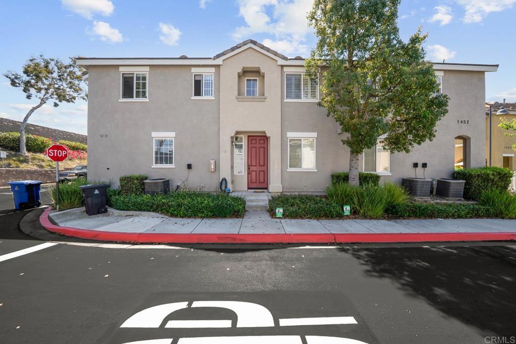 Located in the desirable Monet Community of Otay Ranch, this bright end-unit townhome offers 2 bedrooms and 2 fully renovated bathrooms, perfect for first-time homebuyers or investors. Enjoy the convenience of in-unit laundry and an attached 1-car garage with an EV Tesla charger, ideal for electric vehicle owners. The spacious master bedroom features two closets and a large bathroom with dual sinks for added comfort. Brand new LG appliances are installed throughout the kitchen, complementing the newer flooring and fresh paint, making this home move-in ready. Don’t miss this fantastic opportunity to own a modern, stylish home in a great community!