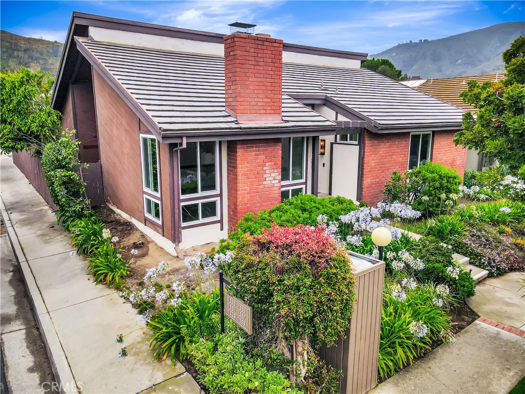This beautifully updated single-level home for rent in Pacific Palisades offers approximately 2,000 square feet of comfortable living space, featuring 3 bedrooms and 2 bathrooms. Located on a private paseo with only one direct neighbor and nestled in a quiet cul-de-sac, the property includes a 2-car garage and spacious outdoor areas ideal for children, including a private backyard patio. The home showcases a fully remodeled master bathroom, new double-pane energy-efficient windows and sliding glass doors, brand-new insulation, a cleaned and remediated attic, and newly installed air ducts. The HVAC system has been serviced, with air vents thoroughly cleaned to improve air quality. Additional interior updates include fresh interior paint with ceiling primer, new interior and exterior lighting, dimmer switches, and upgraded landscaping. The house also features newer tile flooring, a wood-burning fireplace, a brand-new refrigerator, and a washer and dryer. Residents have access to the Santa Ynez Rec Center, which includes an Olympic-size swimming pool, kids’ pool, jacuzzi, tennis courts, playground, gym, and clubhouse. The exterior and surrounding areas have been power-washed following a recent wildfire, ensuring a clean and refreshed look. With award-winning schools nearby—such as Marquez Elementary expected to reopen in the fall—and a local market less than two miles away, this home is an excellent option for families, especially those in the process of rebuilding and looking to stay close by.