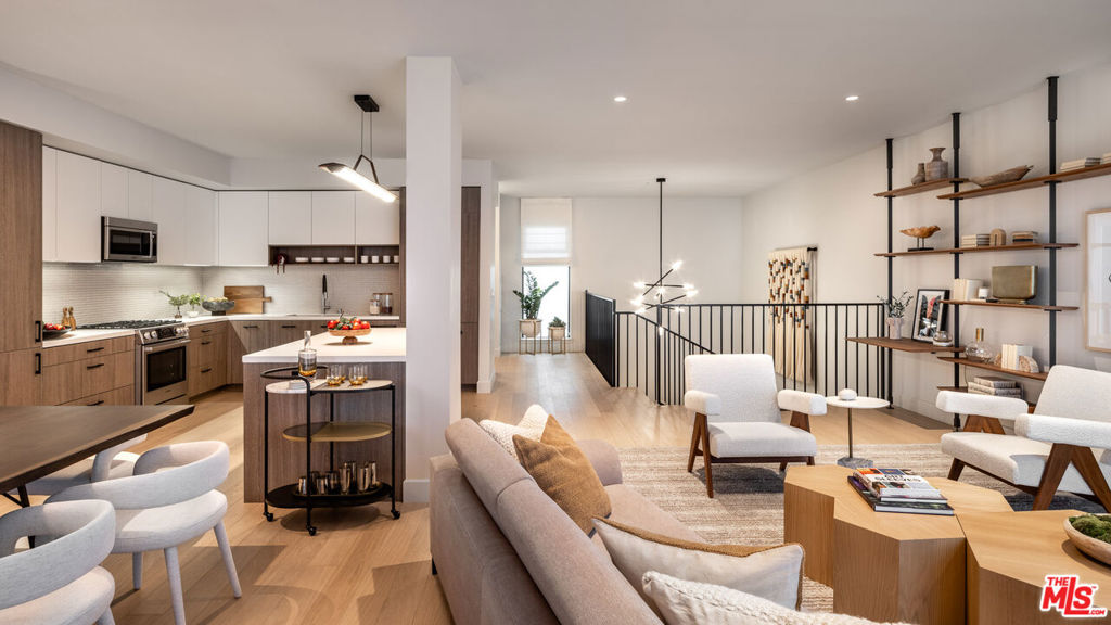 Centered within L.A.'s most dynamic setting situated at the intersection of the cultural and creative cores where West Hollywood's vibrant Design District meets the iconic boutiques, parks and galleries of Beverly Hills, Nine Thousand One provides us with a curated collection of luxury residences which are defined by truly elevated and refined California living. Brimming with natural light and crafted in a clean, California Modern aesthetic, this collection of 46 for-lease residences pairs the high-quality finishes, open-air entrances and private outdoor spaces of a custom-built estate with the elevated amenities of a boutique hotel. Nine Thousand One offers a mix of well-appointed one-bedroom and two-bedroom units, including a limited and exclusive collection of two-story townhomes all ranging from 1,100 to 2,200 square feet and each with private spacious outdoor terraces, expansive floor-to-ceiling windows and sweeping views of the city and Hollywood Hills. Amenities include landscaped outdoor spaces and living areas, an indoor/outdoor club house and business center, fitness center, pool deck, pet spa and park, and two levels of subterranean parking. With unmatched views and a location in the heart of one of the city's most desirable pedestrian-friendly neighborhoods, Nine Thousand One brings a curated Los Angeles living experience to residents in a located that is unmatched and within minutes of Rodeo Drive, the Sunset Strip, the Melrose, Robertson, and Beverly Boulevard shopping districts, and the best that Los Angeles has to offer. Be among the first to experience elevated and true California living at the most coveted new address in town: Nine Thousand One Santa Monica.