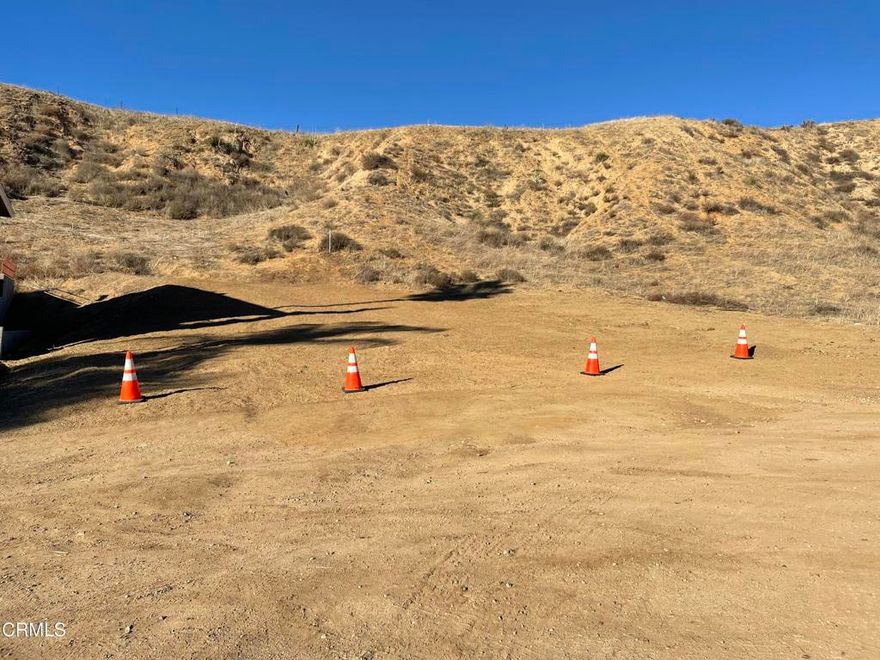 Build your Dream in Val Verde! Welcome to this incredible opportunity to own a vacant parcel of land in the quiet, up-and-coming community of Val Verde. Nestled in the scenic hills of northern Los Angeles County, this lot offers breathtaking hillside views and a tranquil setting just minutes away from Santa Clarita and easy freeway access. This property is ideal for building a custom home, weekend retreat, or simply acquiring as an investment opportunity. With utilities nearby and residential zoning  (buyer to verify with LA county) the possibilities are endless. Don't miss out on the chance to own a slice of California land.  Enjoy stunning sunsets, privacy, and the endless potential this sought-after community has to offer. Drive by and envision your future in Val Verde!