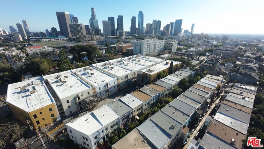 Developer's Dream in Historic Belmont Square  Echo Park. Rare opportunity for builders, flippers, or investors: this 1924 East Coast style duplex by architect David Julius Witmer sits on a coveted pedestrian-only walk street in the historic Belmont Square district. Charming row homes, lush gardens, and private tranquil courtyard environment inspired by historic garden apartments and rare to find in the heart of the city. These "secret" walk streets offer a peaceful residential atmosphere just moments from urban amenities. The duplex at 208 & 210 Columbia features two units, each with 1 bedrooms and 1 bath, ready for a full renovation! Perfect for investors seeking to add value or owner-users looking to live onsite while bringing their vision to life. Separate utility meters for both units, a low-maintenance lot, and a classic duplex layout provide a strong foundation for a full rehab or creative redevelopment. Located minutes from DTLA, Silver Lake, and Historic Filipinotown, this property combines rare architectural character with significant upside potential in one of Los Angeles' most desirable urban neighborhoods. The Historic Belmont Square Duplex is more than a project - it's a chance to shape the evolution of one of LA's most sought-after communities. Bring your creativity, your vision, and your ambition. Don't miss out on this gem!