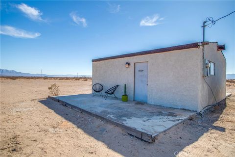 Photo of 82229 Raven Roost, 29 Palms, CA 92277 (MLS # JT25278560)