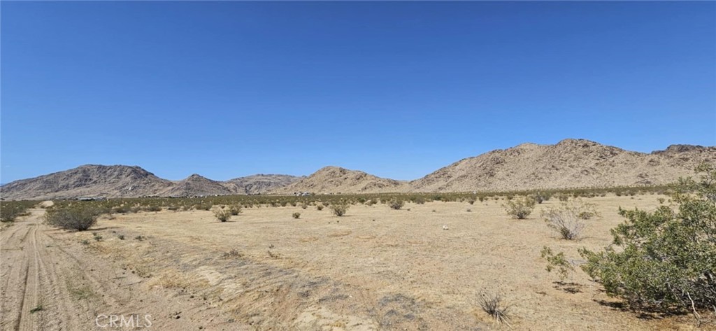 This 2.28 acre flat parcel offers beautiful desert views and a peaceful setting just one parcel off Highway 247 (Barstow Rd). It is located in a great spot for buyers looking to create their own off-grid retreat, weekend escape, or long-term investment in the high desert. With plenty of space to spread out, you can enjoy the quiet surroundings, star-filled skies, and all the outdoor fun Lucerne Valley has to offer—like hiking, off-roading, and exploring nearby natural landmarks. Drive by and check it out before someone else does, invest today! APN: 0453-272-06-0000. Latitude:34.584803, Longitude:-116.972153.