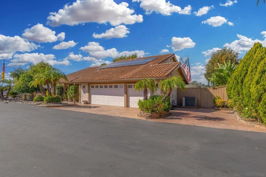 Welcome to Avocado Estates. Experience the perfect blend of space, style, and tranquility in this beautifully tri-level home tucked inside one of El Cajon’s most desirable gated communities. Sitting on a peaceful cul-de-sac, this home offers the ideal balance of privacy and convenience. Step inside to find a bright, open layout filled with natural light, featuring multiple living areas, a stylish updated kitchen with brand-new appliances & brand induction stove, and a cozy bar area perfect for entertaining. The primary suite with its private balcony and serene views sits alongside two additional bedrooms on the upper level, while the fourth bedroom on the main level is perfect for guests or a home office. Enjoy outdoor living at its best with multiple patios, a generous backyard, and energy-efficient paid solar for low utility costs. Avocado Estates offers resort-style amenities including a large pool, relaxing spa, BBQ areas, and avocado groves where you can pick your own fruit a true hidden gem of East County! This home delivers the space you want, the lifestyle you deserve, and the community everyone loves.