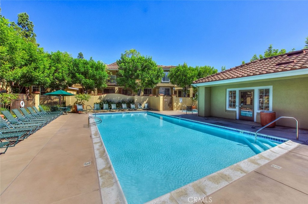 Warm and welcoming, this charming one level second floor condo is centrally located in the Shadow Canyon Community in Tustin Ranch with convenient access to restaurants, shopping, freeways and toll roads. Its light and open floor plan encompassing one bedroom, one bathroom, a dining area, a spacious living room, voluminous ceilings and recessed lighting. The fully equipped kitchen boasts custom cabinets and a generous eating counter. The bedroom has an attractive bath and a generous walk-in closet. Enjoy outdoor entertaining on your private patio or take advantage of the wonderful community clubhouse adorned with a pool, spa, workout facility, barbecue picnic areas, tennis courts and tot lots. Additional amenities include an indoor laundry area and a one-car garage. With award-winning schools and a quiet and desirable neighborhood, this home has been meticulously cared for and is move-in ready for the most discerning renter.