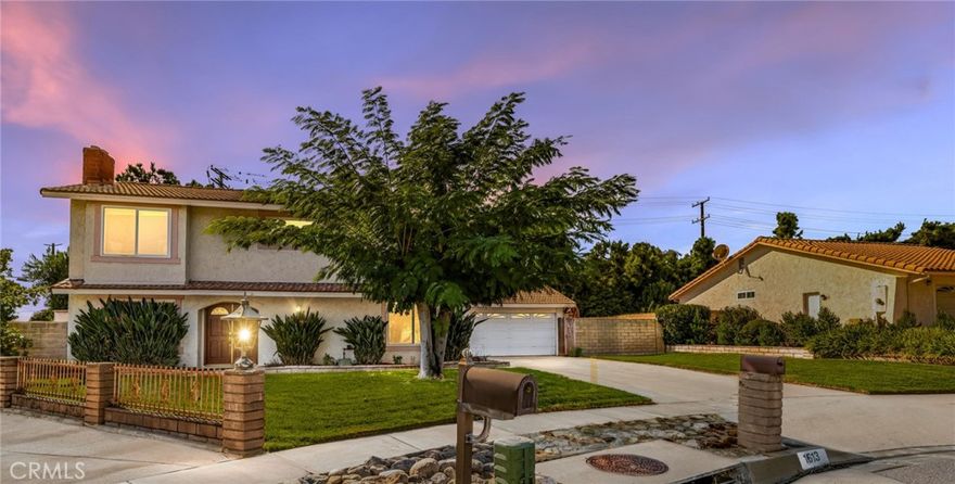 Welcome to 1613 N. Erin Avenue, a rare Upland estate set at the end of a quiet cul-de-sac on an expansive lot. The main residence offers four bedrooms and three bathrooms with a functional layout, including a spacious primary suite, with a fireplace, formal dining room, living room, kitchen, and inviting family room. An updated attached two-car finished garage features epoxy floors, built-in cabinetry, and recessed lighting, plus a brand-new water heater for added peace of mind.



A beautifully updated guest house/ADU of nearly 1,000 sq ft with high ceilings includes a full kitchen, living room and large bedroom with plantation shutters overlooking colorful bougainvillea , and a stylish bathroom with a walk-in shower — ideal for extended family, guests, or rental potential income.



The large private backyard is a true retreat with lush lawn, endless rose bushes, apricot, peach and tangerine trees, mature landscaping, and room to create your dream outdoor oasis. Plenty of room to build a pool. Tall ficus trees along both perimeters of the backyard ensure complete privacy from neighbors.



All tucked away in a prime Upland location near top schools, shopping, and dining, and easy access to the 210 and 10 fwys.
